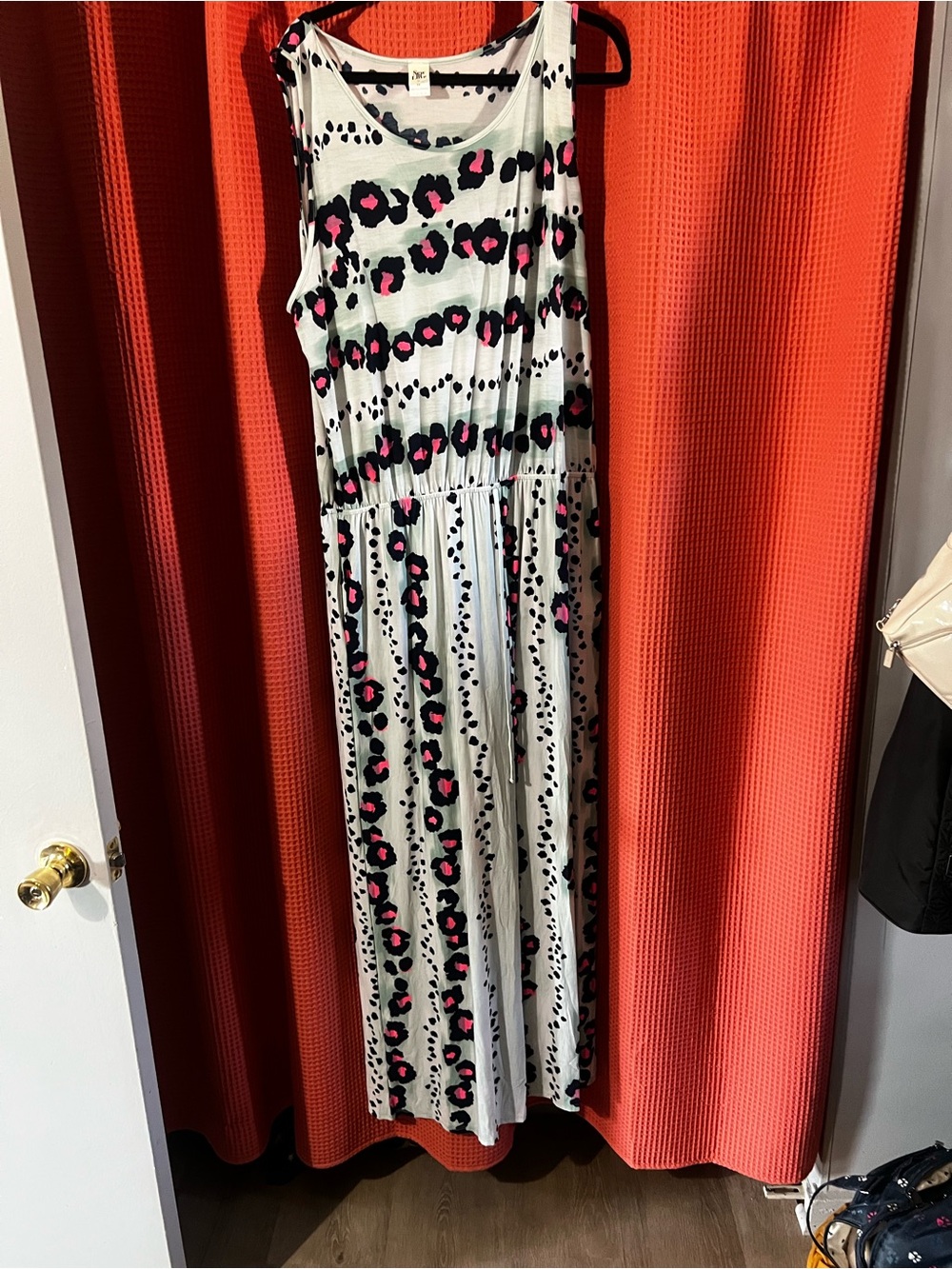 Sleeveless Animal Print jumpsuit with Pink Accents